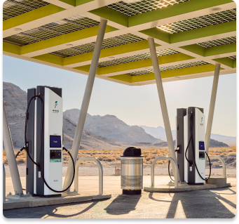 Two Electrify America charging stations under a canopy